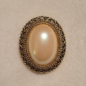 Vintage Gold-Tone Oval Brooch Featuring a Large Central Faux Pearl Cabochon